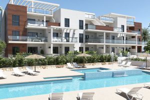 Modern duplex apartments in Alicante with rooftop terraces, garden patios, and beachside living – exterior, interior, and layout views.