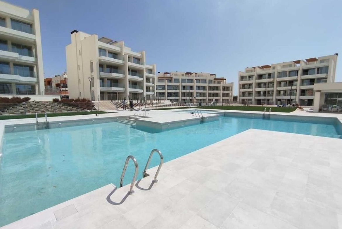 Stylish apartments for sale in Alicante near golf courses and beaches, featuring modern interiors, panoramic balconies, and Mediterranean lifestyle views.