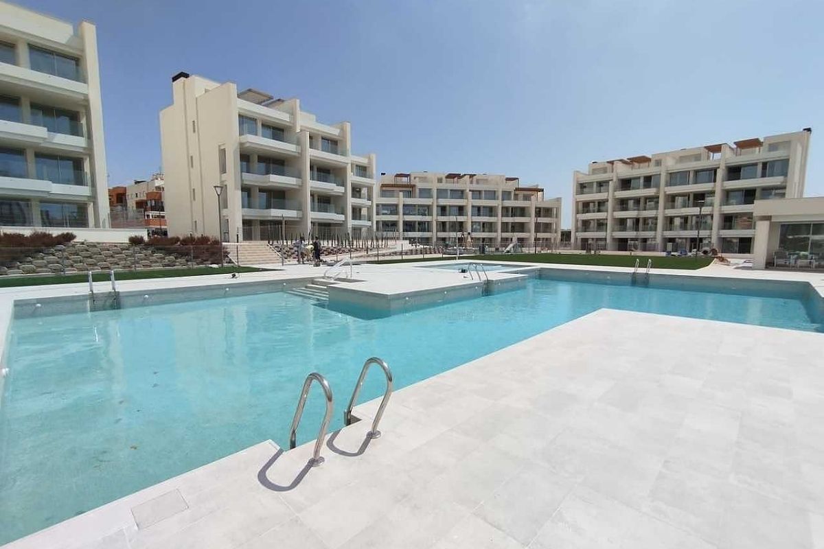 Stylish apartments for sale in Alicante near golf courses and beaches, featuring modern interiors, panoramic balconies, and Mediterranean lifestyle views.