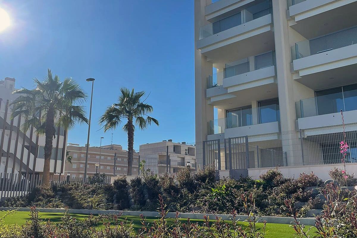 Stylish apartments for sale in Alicante near golf courses and beaches, featuring modern interiors, panoramic balconies, and Mediterranean lifestyle views.