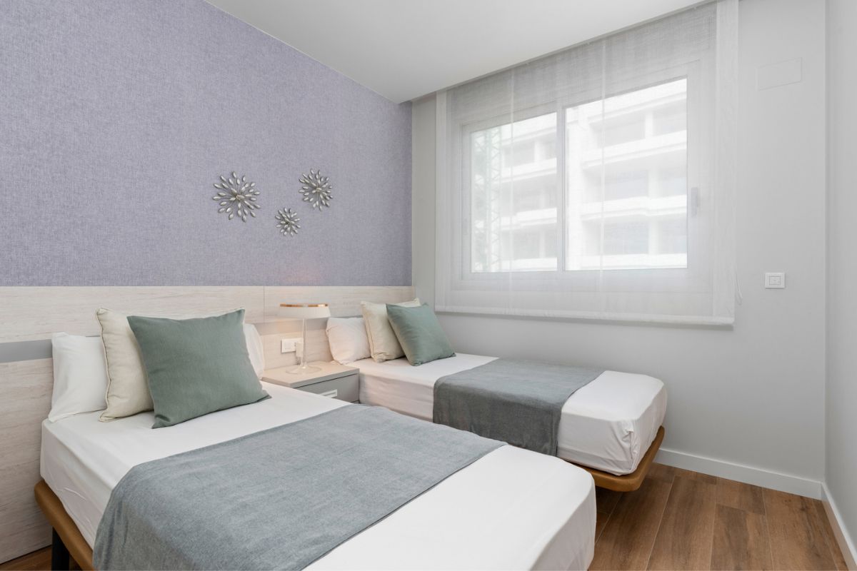 Stylish apartments for sale in Alicante near golf courses and beaches, featuring modern interiors, panoramic balconies, and Mediterranean lifestyle views.