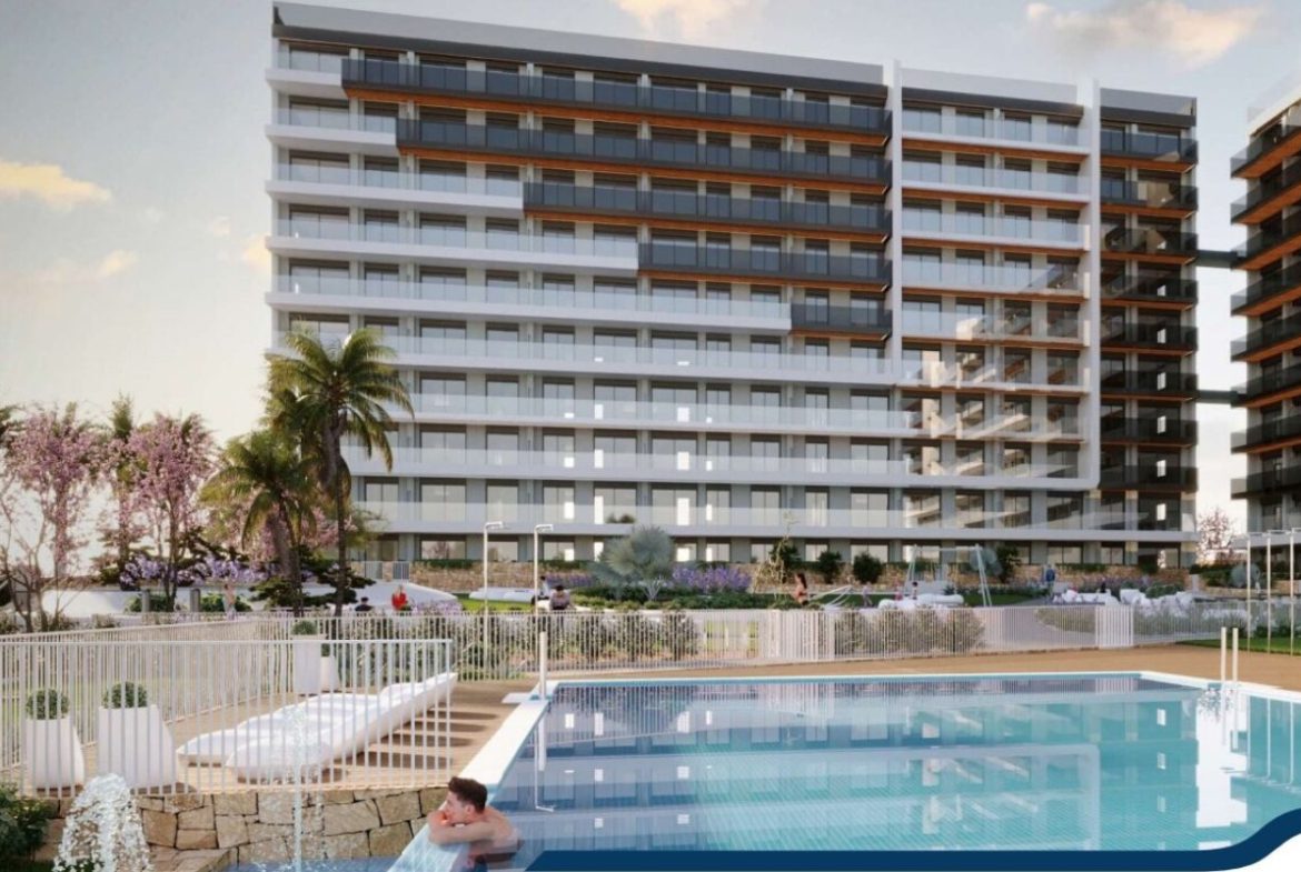 Elegant sea view apartments for sale in Costa Blanca with beach access, modern design, and communal pools.