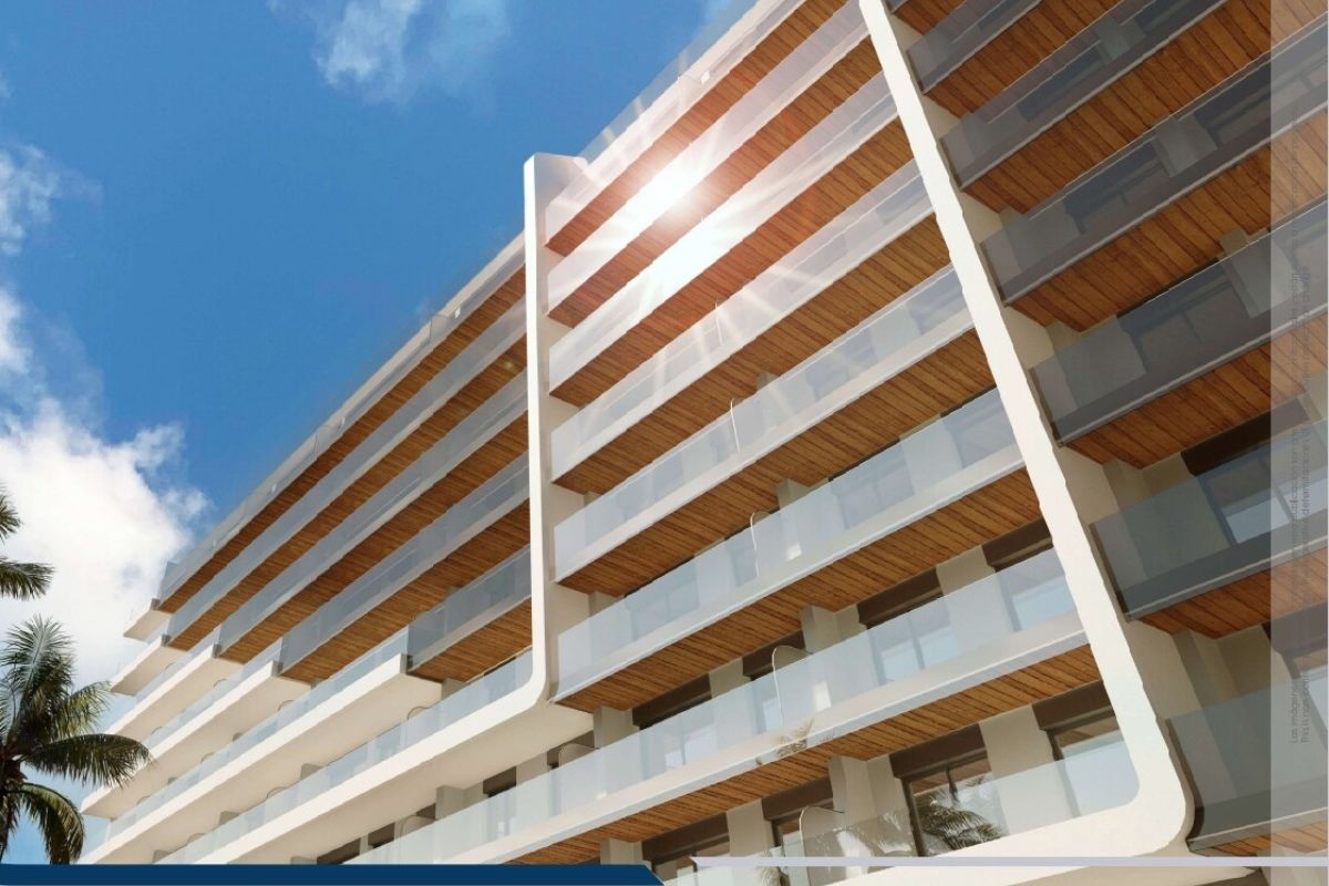 Elegant sea view apartments for sale in Costa Blanca with beach access, modern design, and communal pools.