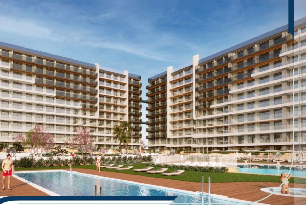 Elegant sea view apartments for sale in Costa Blanca with beach access, modern design, and communal pools.