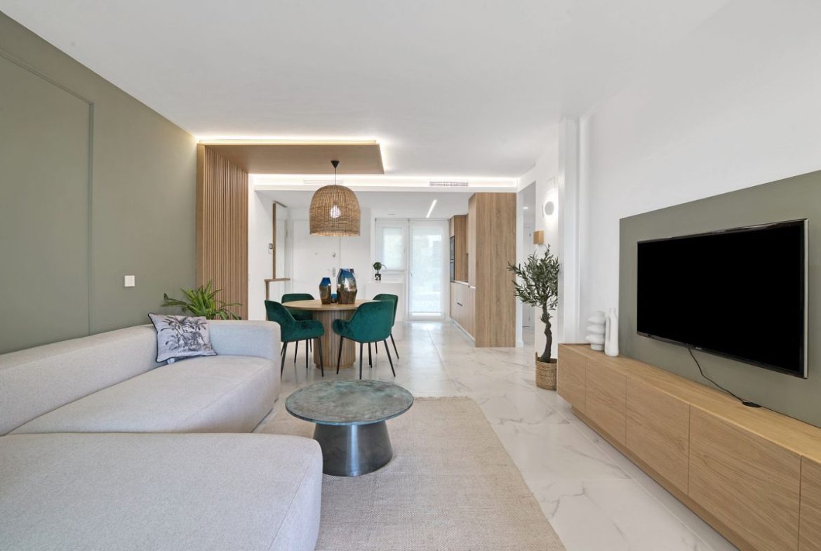 Elegant sea view apartments for sale in Costa Blanca with beach access, modern design, and communal pools.