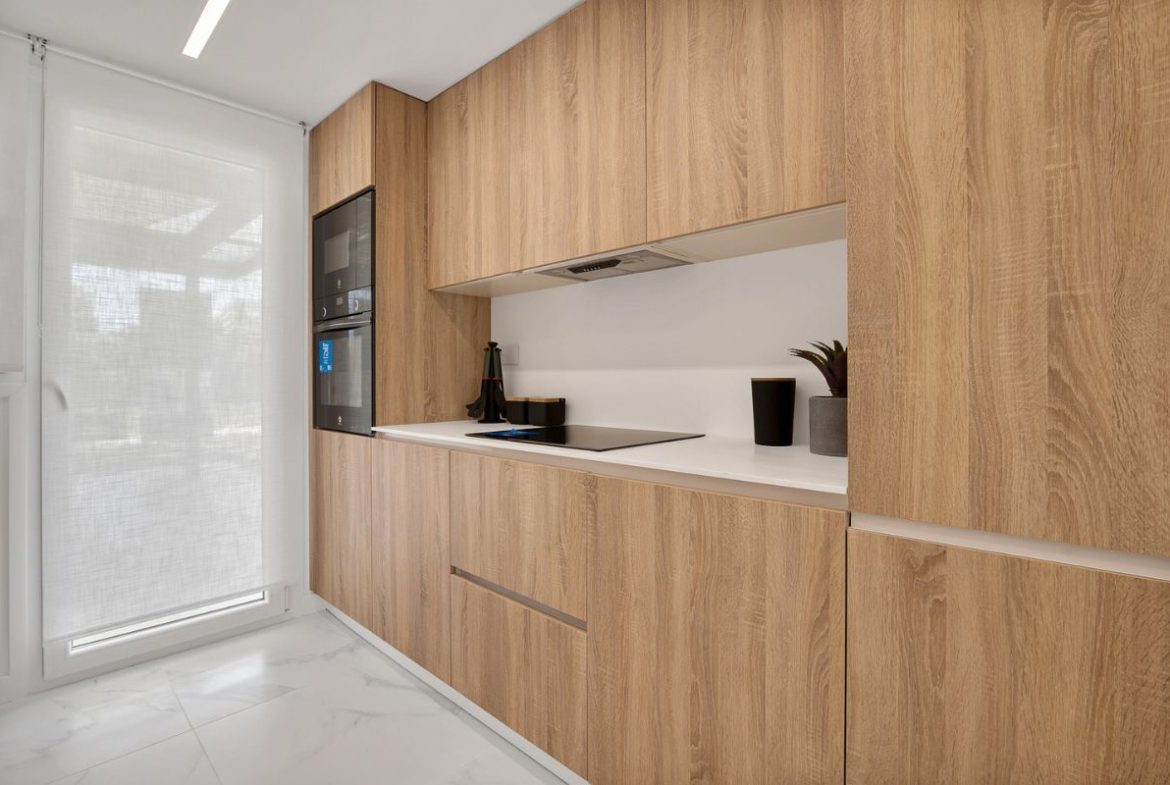 Elegant sea view apartments for sale in Costa Blanca with beach access, modern design, and communal pools.