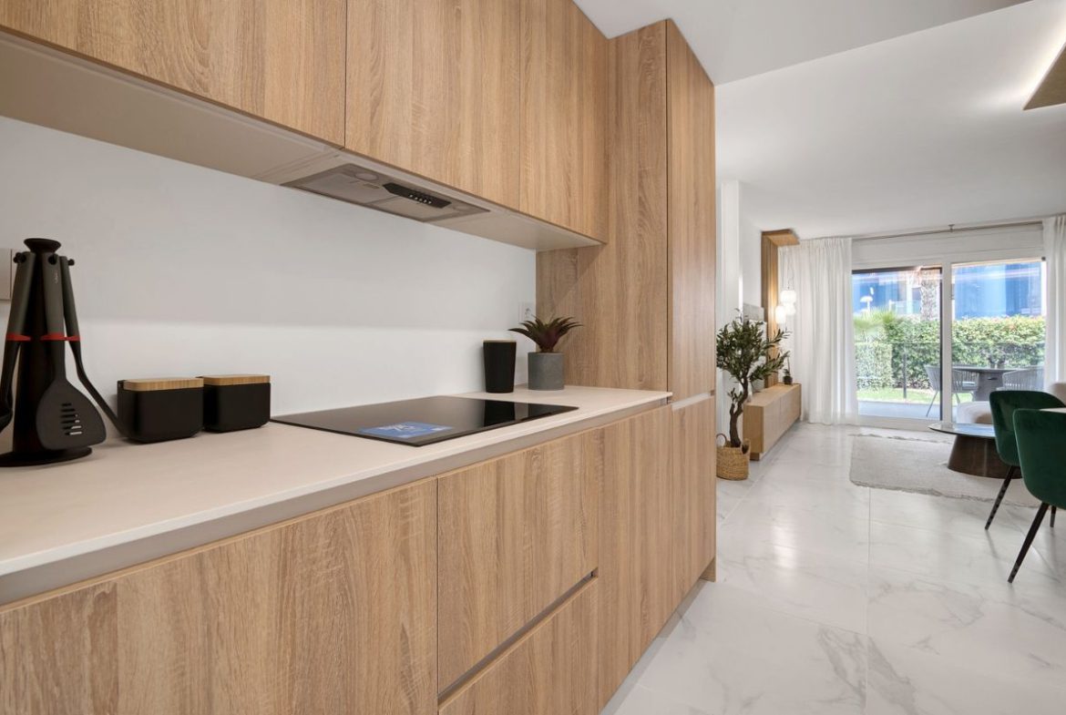 Elegant sea view apartments for sale in Costa Blanca with beach access, modern design, and communal pools.