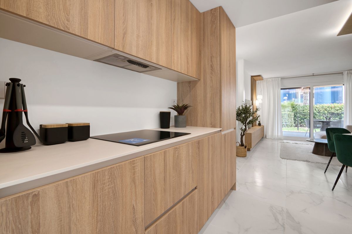 Elegant sea view apartments for sale in Costa Blanca with beach access, modern design, and communal pools.