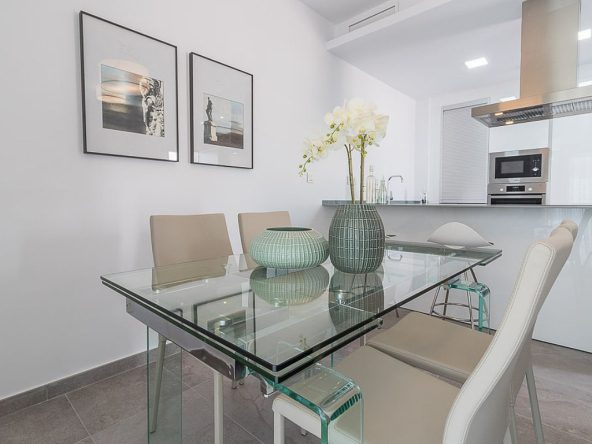 Modern ready apartments for sale in Alicante featuring rooftop terraces, private gardens, communal pool, and close proximity to beaches and golf courses.