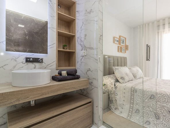 Modern ready apartments for sale in Alicante featuring rooftop terraces, private gardens, communal pool, and close proximity to beaches and golf courses.