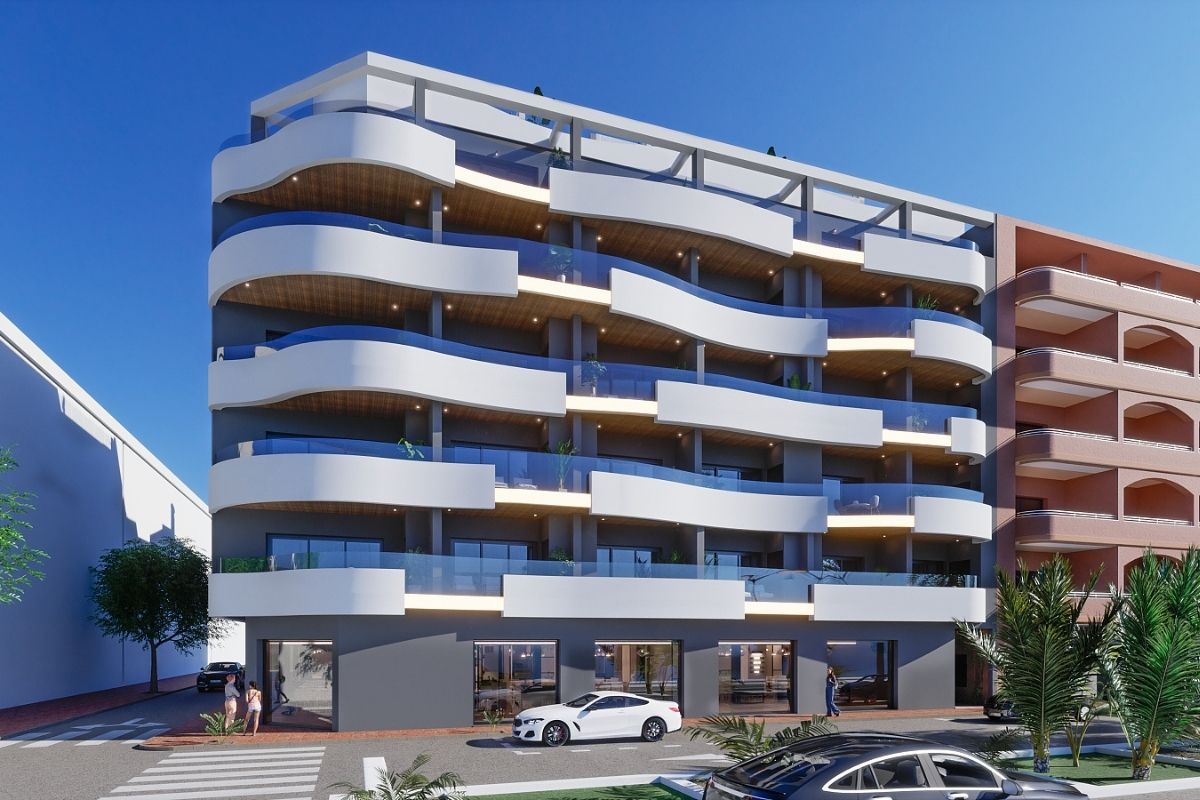Contemporary beachside apartments for sale in Spain, just 100 meters from the Mediterranean, with modern design, balconies, and excellent location.