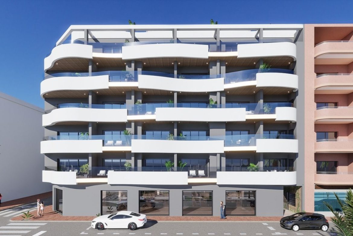 Contemporary beachside apartments for sale in Spain, just 100 meters from the Mediterranean, with modern design, balconies, and excellent location.