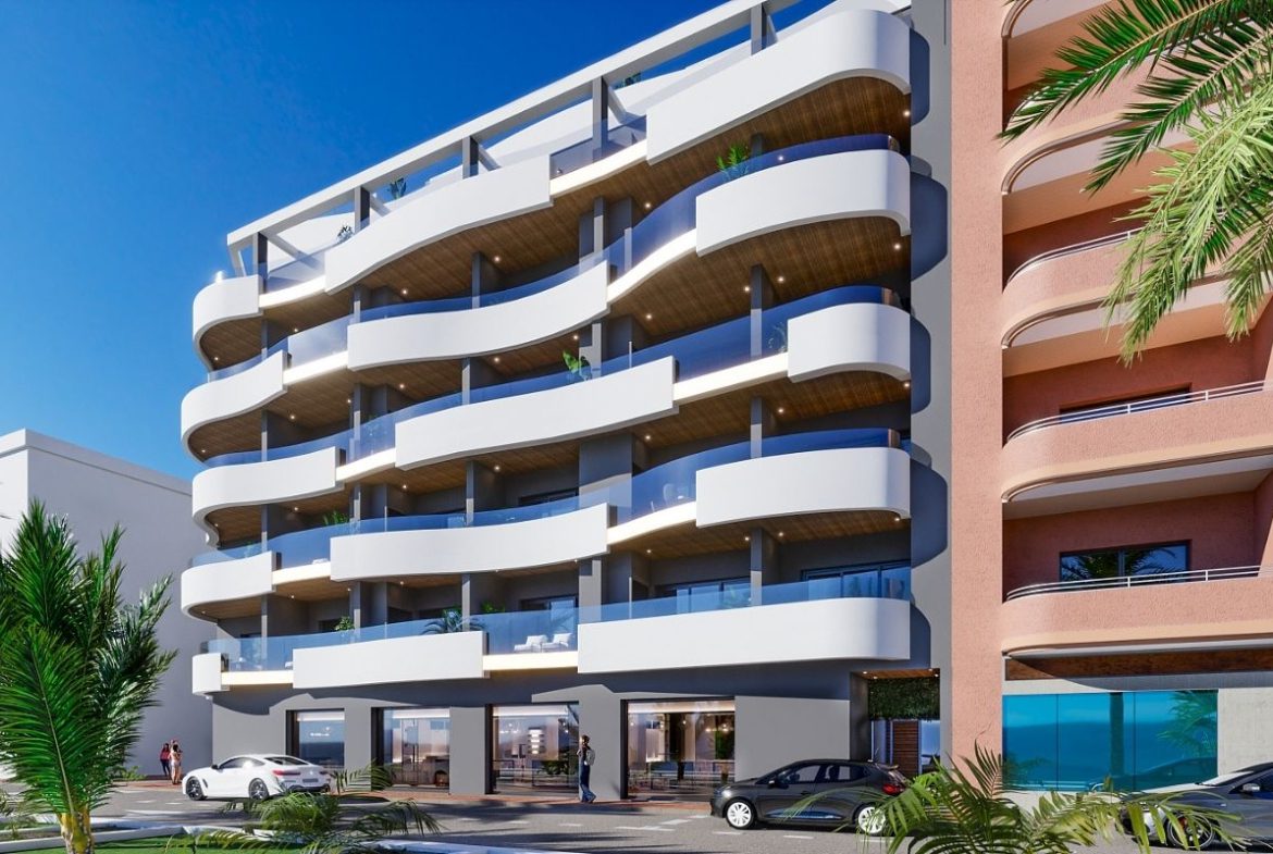 Contemporary beachside apartments for sale in Spain, just 100 meters from the Mediterranean, with modern design, balconies, and excellent location.