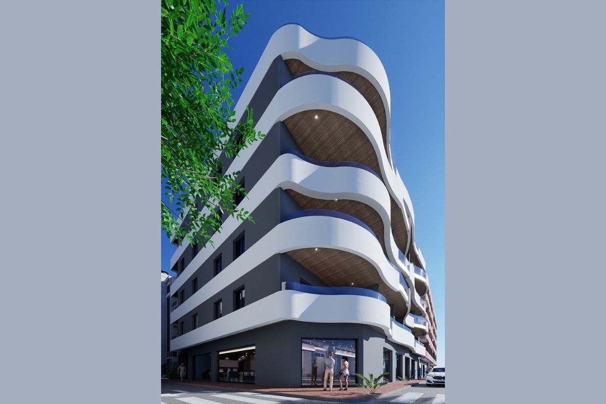 Contemporary beachside apartments for sale in Spain, just 100 meters from the Mediterranean, with modern design, balconies, and excellent location.