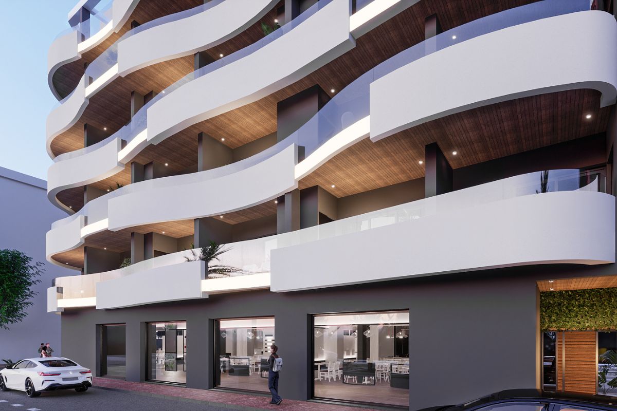 Contemporary beachside apartments for sale in Spain, just 100 meters from the Mediterranean, with modern design, balconies, and excellent location.