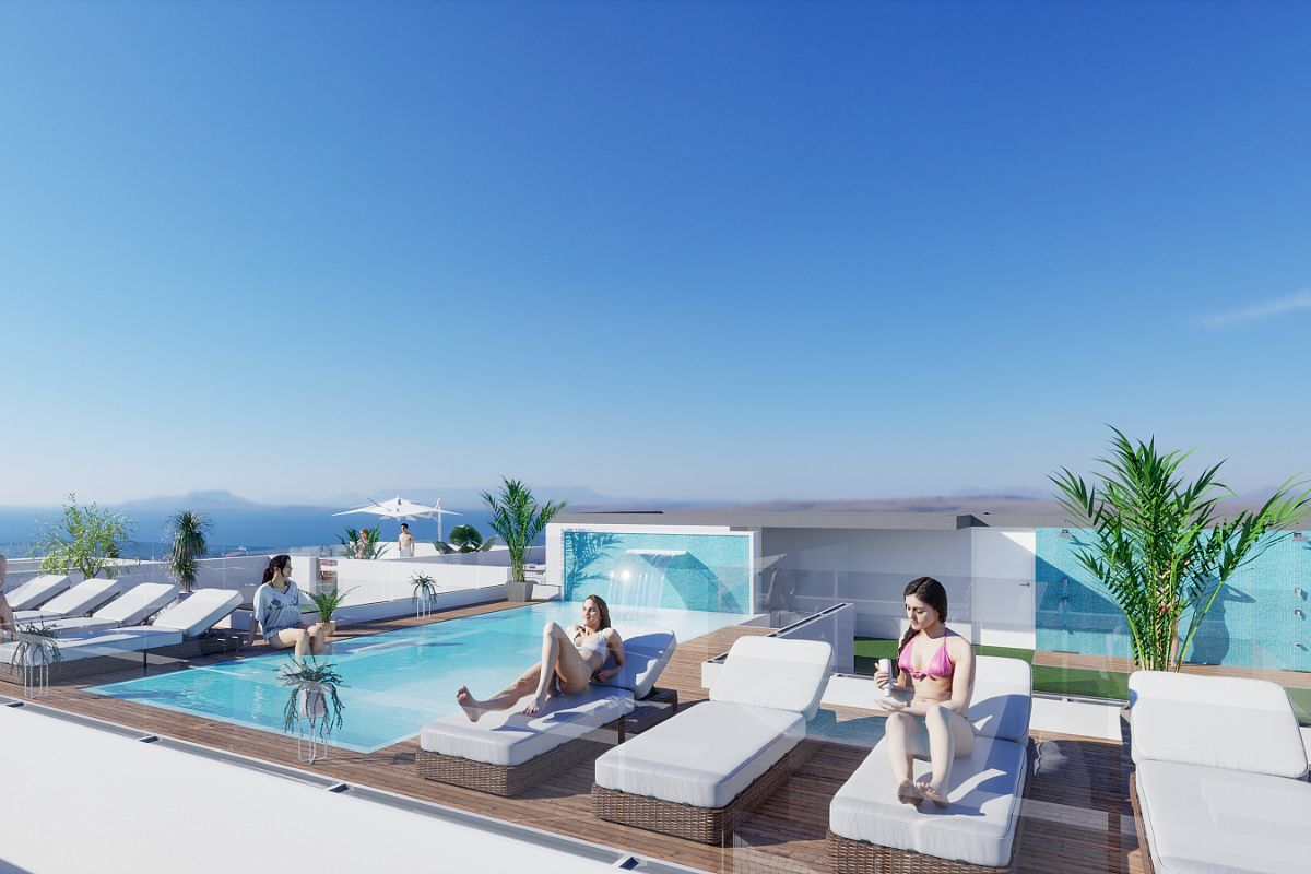 Contemporary beachside apartments for sale in Spain, just 100 meters from the Mediterranean, with modern design, balconies, and excellent location.