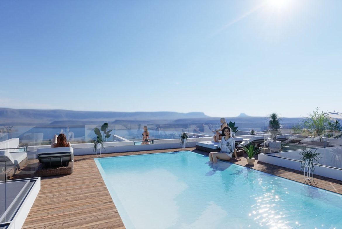 Contemporary beachside apartments for sale in Spain, just 100 meters from the Mediterranean, with modern design, balconies, and excellent location.
