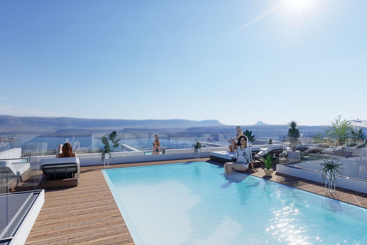 Contemporary beachside apartments for sale in Spain, just 100 meters from the Mediterranean, with modern design, balconies, and excellent location.