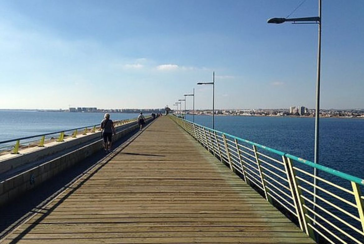Contemporary beachside apartments for sale in Spain, just 100 meters from the Mediterranean, with modern design, balconies, and excellent location.