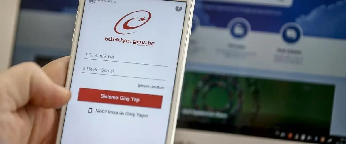 Turkish e-Government app open on a smartphone for checking or retrieving tax ID number
