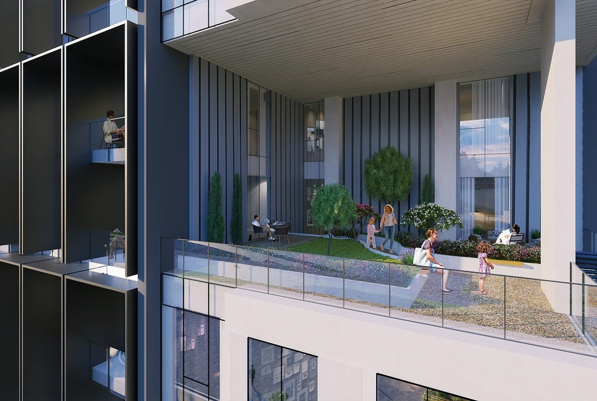 Modern building with landscaped entrance.