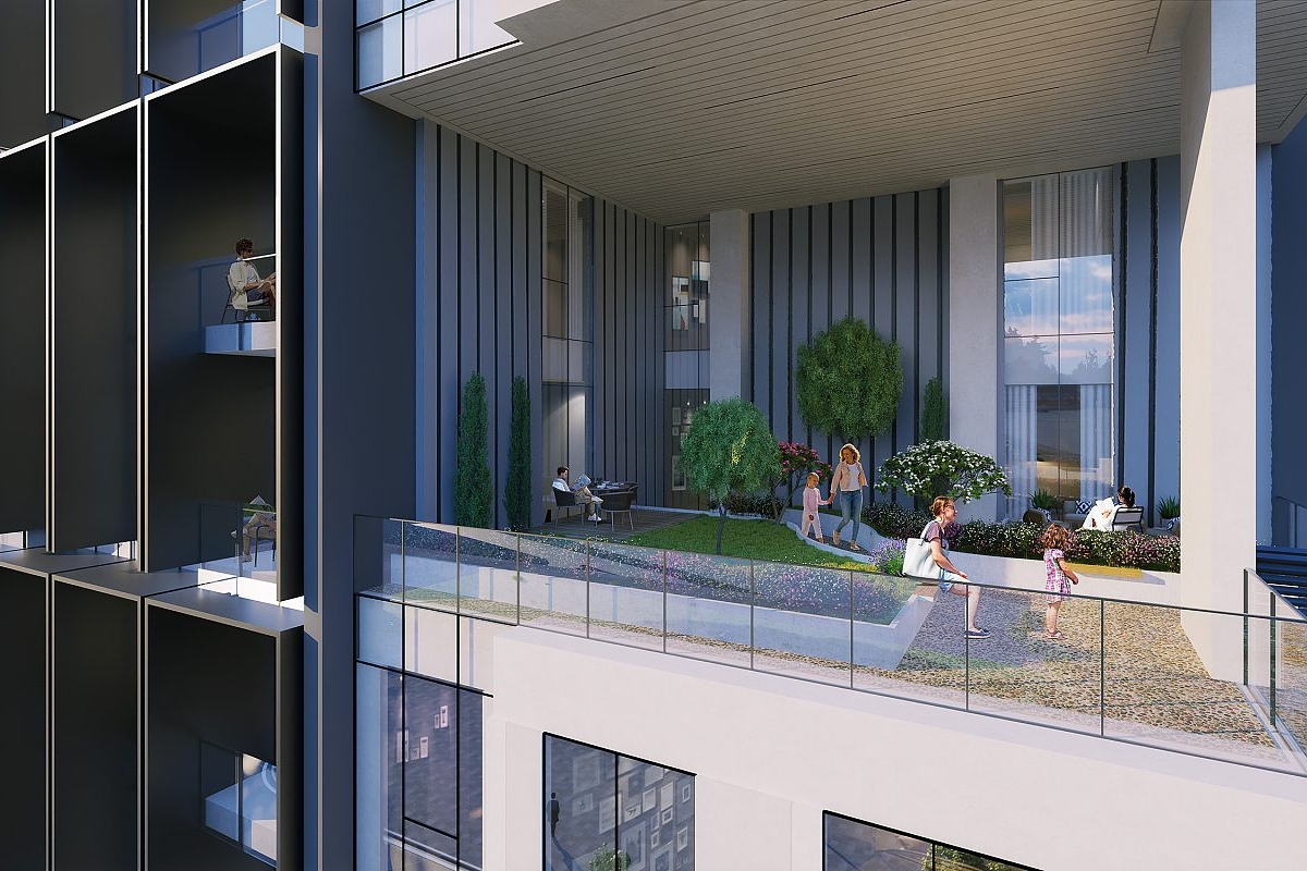 Modern building with landscaped entrance.